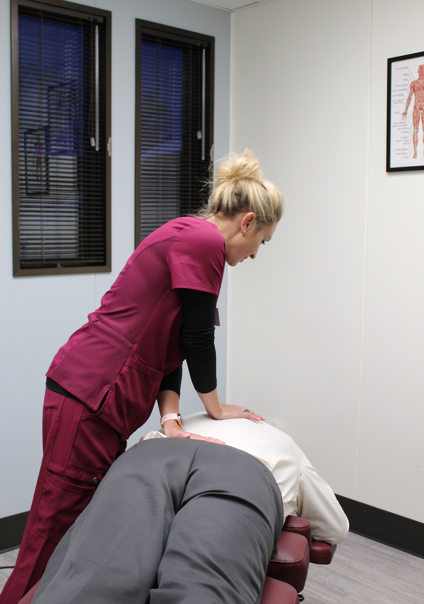 Dr. Jennifer Gonzalez adjusts a chiropractic patient