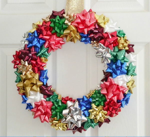 Crafting a holiday wreath out of gift bows
