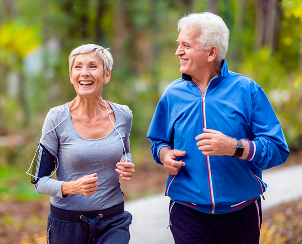 Healthy older adults enjoying a morning jog 