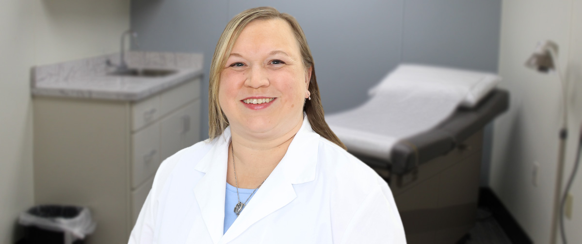 Photo of Dr. Cynthia Meyer in an exam room; Dr. Meyer is a board-certified internist treating patients at Troy Laurel Health Center, located at 45 Mud Creek Rd. in Troy PA