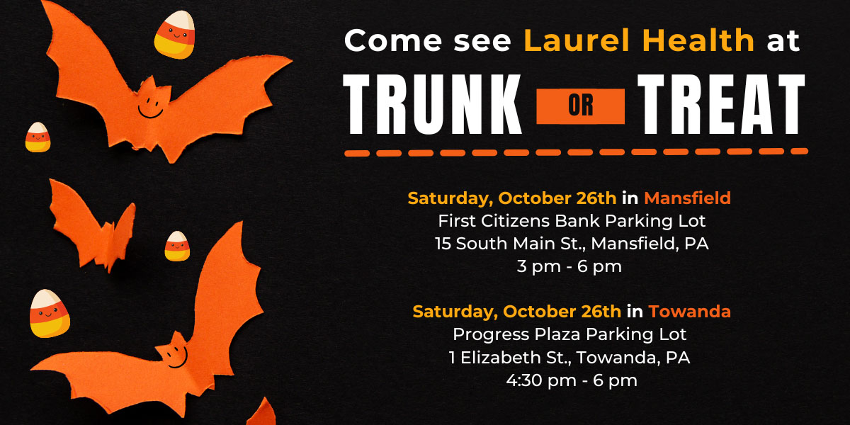 Halloween graphic featuring smiling orange bats and candy corn announcing Laurel Health will participate in trunk or treat events on Saturday, October 26, 2024, in Mansfield, PA and Towanda, PA.